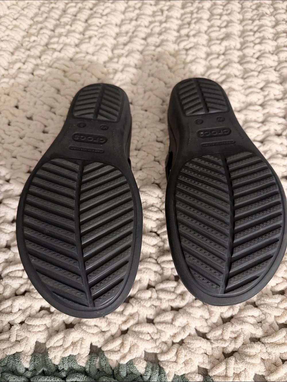 CROCS Black Thong Sandals with Silver Hammered Discs